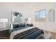 Spacious bedroom with a comfortable bed and large window at 3082 E Jade Ct, Chandler, AZ 85286