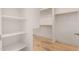 Large walk-in closet with built-in shelves and rods at 3082 E Jade Ct, Chandler, AZ 85286