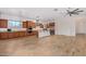 Open concept kitchen features stainless steel appliances and an island at 3082 E Jade Ct, Chandler, AZ 85286
