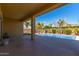 Covered patio overlooking the refreshing pool and backyard at 3082 E Jade Ct, Chandler, AZ 85286