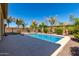 Relaxing pool area with palm trees and plenty of space for entertaining at 3082 E Jade Ct, Chandler, AZ 85286
