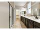 Elegant bathroom with double sinks and large mirrors at 333 N Calle Largo --, Mesa, AZ 85207
