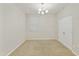 Well-lit bedroom with carpet flooring and chandelier at 333 N Calle Largo --, Mesa, AZ 85207