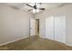 Neutral bedroom with ceiling fan and carpet flooring at 333 N Calle Largo --, Mesa, AZ 85207