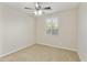 Bright bedroom with window and ceiling fan at 333 N Calle Largo --, Mesa, AZ 85207