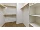 Spacious walk-in closet with shelves and hanging rods at 333 N Calle Largo --, Mesa, AZ 85207
