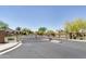 Gated community entrance with paved road and signage at 333 N Calle Largo --, Mesa, AZ 85207