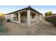 Rear view of house with covered patio and outdoor kitchen at 333 N Calle Largo --, Mesa, AZ 85207