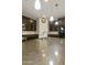 Kitchen island with granite countertops and modern pendant lighting at 333 N Calle Largo --, Mesa, AZ 85207
