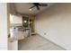 Covered patio with ceiling fan and access to outdoor kitchen at 333 N Calle Largo --, Mesa, AZ 85207
