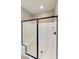 Walk-in shower with a single glass door and bench at 333 N Calle Largo --, Mesa, AZ 85207