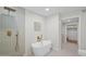 Elegant bathroom with freestanding tub and walk-in shower at 3828 E Covina St, Mesa, AZ 85205