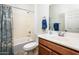 Clean bathroom with tub, shower, and updated vanity at 41999 W Solitare Dr, Maricopa, AZ 85138