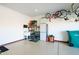 Garage with overhead storage, workbench and utility sink at 41999 W Solitare Dr, Maricopa, AZ 85138