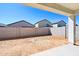 View of the yard with concrete and cinder block fencing at 47771 W Mellen Ln, Maricopa, AZ 85139