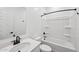 Bathroom featuring a vanity, toilet, and a shower and tub combo at 47771 W Mellen Ln, Maricopa, AZ 85139