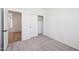 Comfortable bedroom with plush carpet, a closet, and a bright window, perfect for relaxation and rest at 47771 W Mellen Ln, Maricopa, AZ 85139
