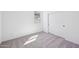 Cozy bedroom with carpet and a view from the window at 47771 W Mellen Ln, Maricopa, AZ 85139