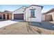Inviting home featuring desert landscaping for easy maintenance at 47771 W Mellen Ln, Maricopa, AZ 85139