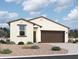 Single-story home with brown garage door and desert landscaping at 47771 W Mellen Ln, Maricopa, AZ 85139