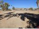 Large backyard with distant mountain view at 51989 W Esch Trl, Maricopa, AZ 85139