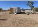 Property with two storage buildings at 51989 W Esch Trl, Maricopa, AZ 85139