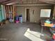 Unfinished basement with lots of storage space at 51989 W Esch Trl, Maricopa, AZ 85139