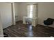 Simple office space with a desk and chair at 51989 W Esch Trl, Maricopa, AZ 85139