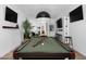 Pool table is the centerpiece of this game room, perfect for entertainment at 6933 E 1St St # B, Scottsdale, AZ 85251