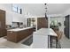 Modern kitchen with a large island, breakfast bar and high end finishes at 6933 E 1St St # B, Scottsdale, AZ 85251