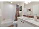 Charming bathroom with colorful shower curtain and white vanity at 7316 N Via Camello Del Norte -- # 107, Scottsdale, AZ 85258