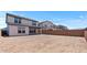 Spacious backyard featuring dirt landscaping and block wall fence at 7416 S 76Th Ln, Laveen, AZ 85339