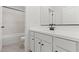 Stylish bathroom with vanity, bathtub, and modern finishes at 7416 S 76Th Ln, Laveen, AZ 85339