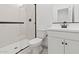 Modern bathroom with walk-in shower, sleek fixtures, and bright lighting at 7416 S 76Th Ln, Laveen, AZ 85339
