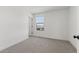 Well-lit bedroom with large window overlooking the neighborhood at 7416 S 76Th Ln, Laveen, AZ 85339