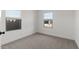 Neutral bedroom with a street view at 7416 S 76Th Ln, Laveen, AZ 85339