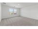 Spacious bedroom with natural light and plush carpet at 7416 S 76Th Ln, Laveen, AZ 85339