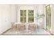 Modern dining area with large oval table and chairs at 7416 S 76Th Ln, Laveen, AZ 85339