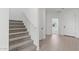 A foyer featuring a staircase and entry view to the outside at 7416 S 76Th Ln, Laveen, AZ 85339