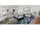 Bright open-concept living room with stylish furniture and modern decor at 7416 S 76Th Ln, Laveen, AZ 85339