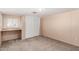 Simple bedroom with built-in shelving and window at 747 E Germann Rd # 67, San Tan Valley, AZ 85140