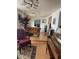 Dining room features hardwood floors and a view into the kitchen at 747 E Germann Rd # 67, San Tan Valley, AZ 85140
