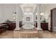 Elegant bathroom featuring a freestanding tub and double vanities at 8315 E Palm Ln, Mesa, AZ 85207