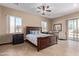 King-size bed in spacious bedroom with ensuite at 8315 E Palm Ln, Mesa, AZ 85207