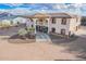 Two-story house with a large front porch and three-car garage at 8315 E Palm Ln, Mesa, AZ 85207
