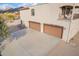 Three car garage with attached house at 8315 E Palm Ln, Mesa, AZ 85207