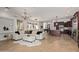 Open concept kitchen and living area with modern cabinetry and large island at 8315 E Palm Ln, Mesa, AZ 85207