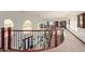 Open and bright upper hallway with stunning views from arched windows at 8315 E Palm Ln, Mesa, AZ 85207