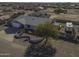 Single story home with landscaped front yard, large driveway and RV parking at 8547 W Magnum Dr, Arizona City, AZ 85123