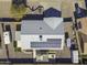 House with solar panels, backyard patio, and surrounding landscape at 8547 W Magnum Dr, Arizona City, AZ 85123